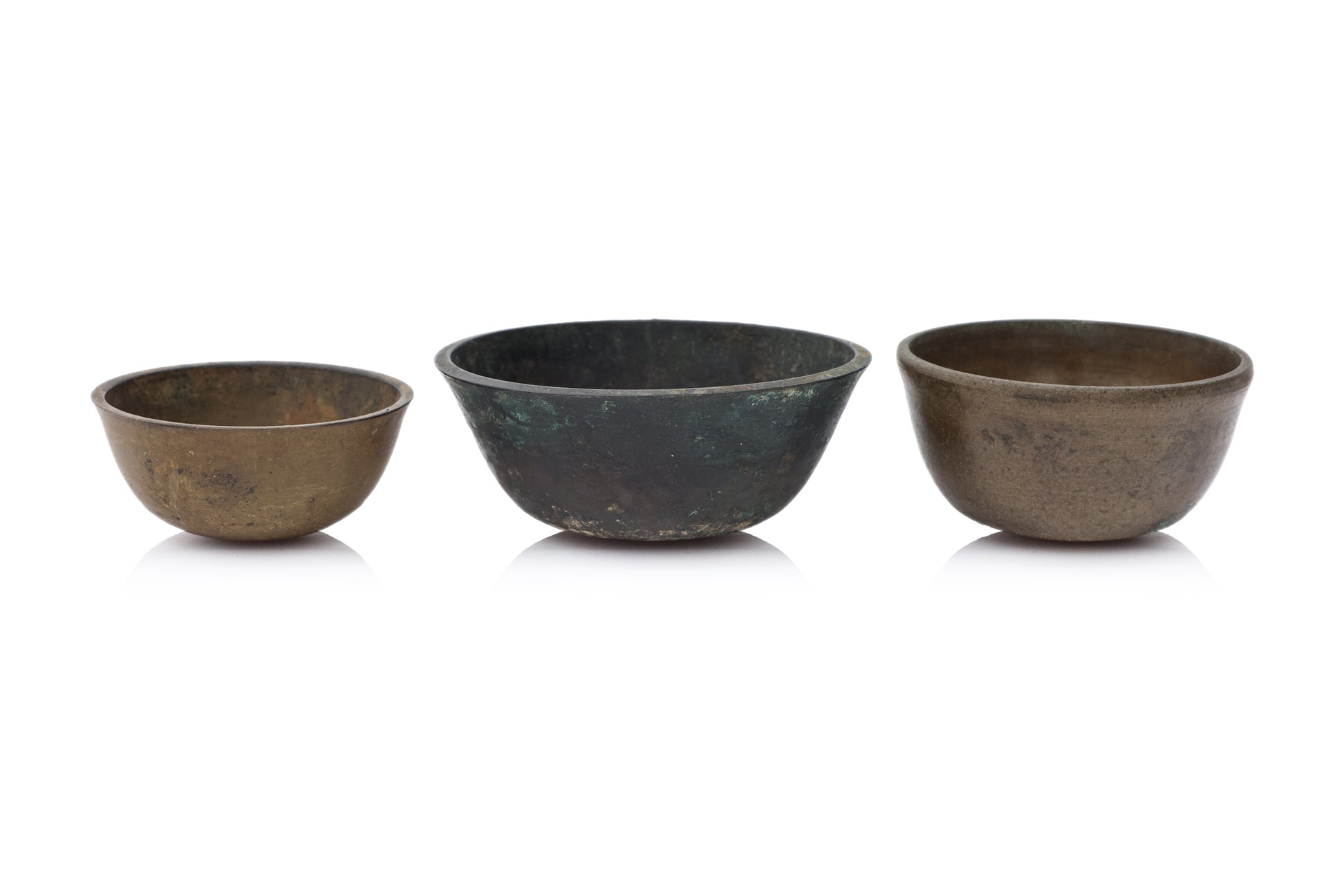 A GROUP OF SIX SOUTH EAST ASIAN BRONZE BOWLS