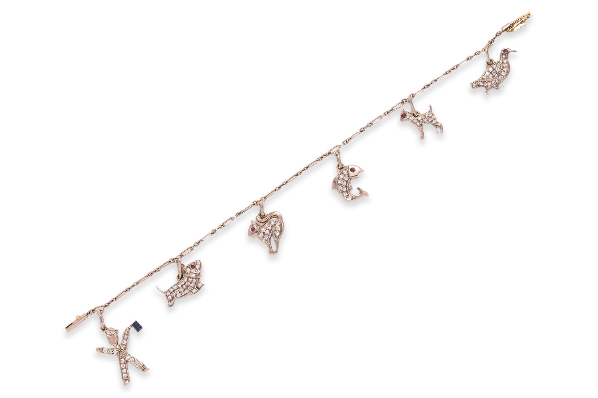 A CHARM BRACELET WITH ANIMAL AND FIGURATIVE CHARMS