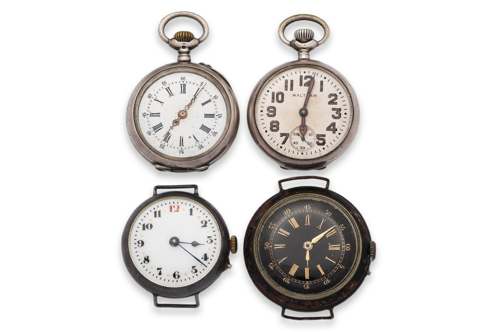 A GROUP OF FOUR WATCHES