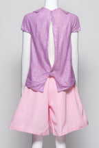 AKIRA – A LILAC BEADED BLOUSE AND PINK SHORTS