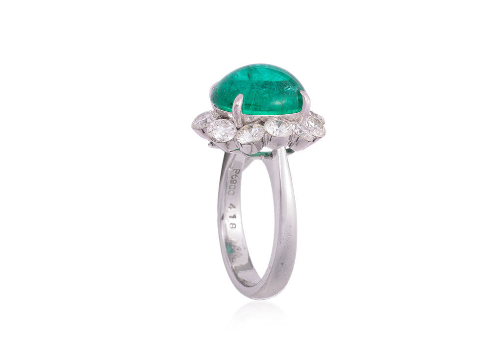 A ZAMBIAN EMERALD AND DIAMOND 'HALO' RING