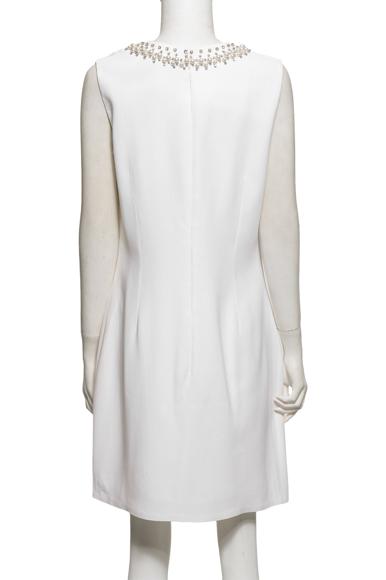 GIVENCHY - A WHITE SLEEVELESS DRESS WITH FAUX PEARL EMBELLISHMENT