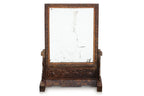 A CARVED HARDWOOD TABLE MIRROR