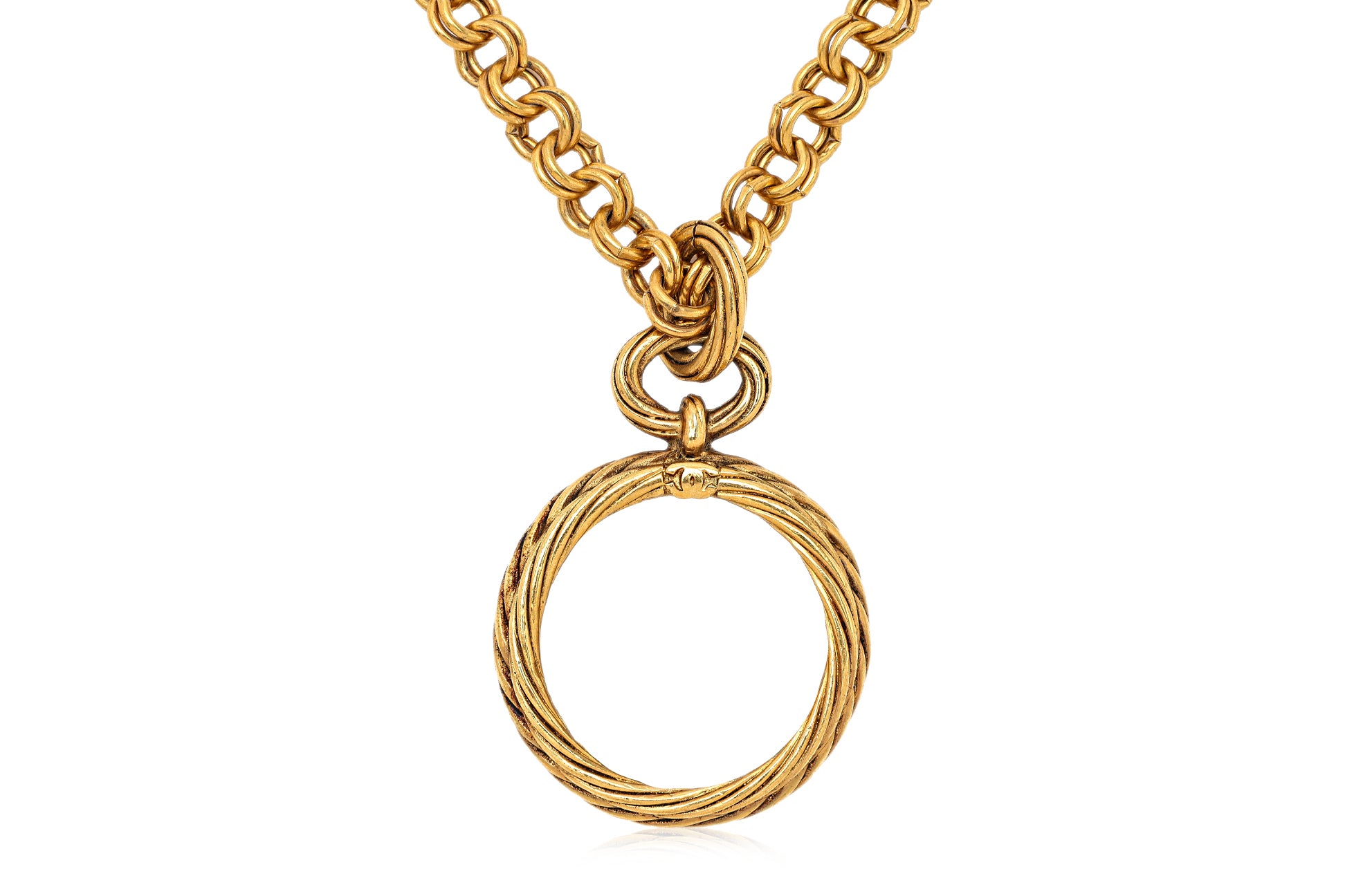 A CHANEL MONOCLE ON CHAIN