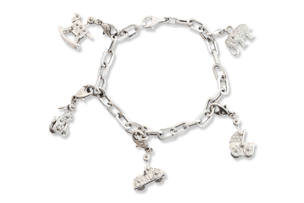 A CHARM BRACELET WITH DETACHABLE DIAMOND-SET CHARMS