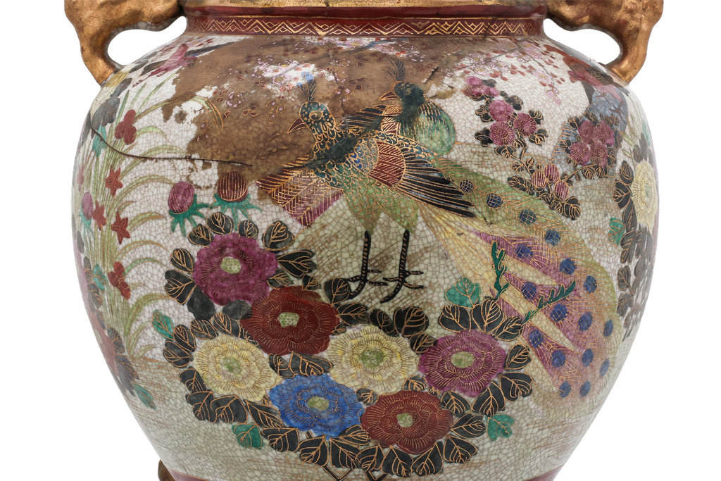 A LARGE SATSUMA POTTERY JAR AND COVER