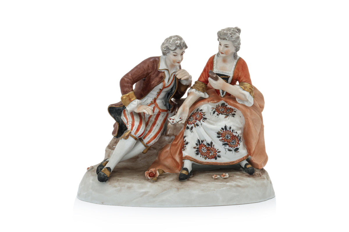A GROUP OF THREE GERMAN PORCELAIN FIGURAL GROUPS