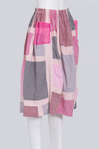 COMME DES GARCONS TRICOT - A 2017 PINK CANVAS CHECKED PATCHWORK SKIRT