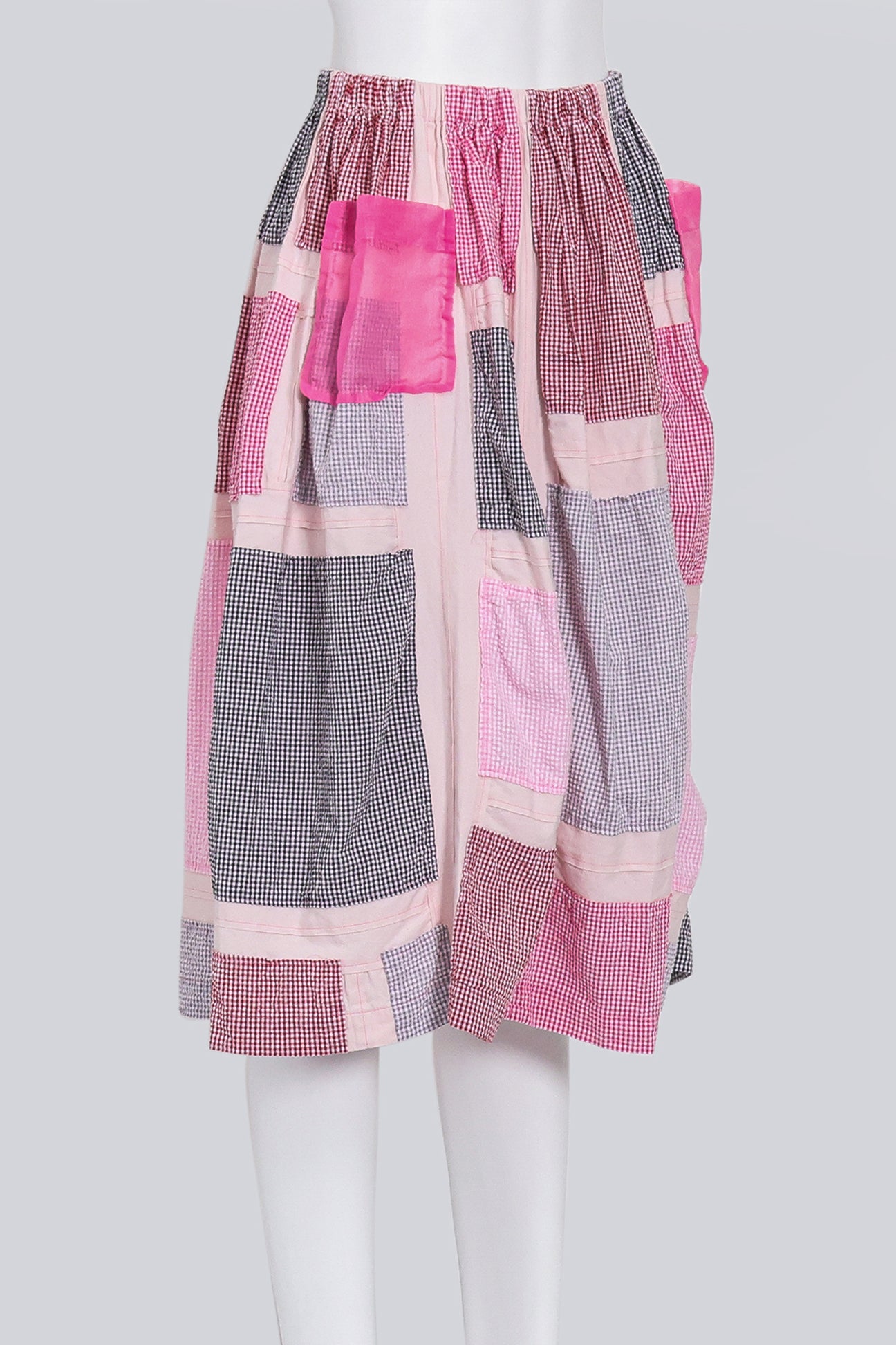 COMME DES GARCONS TRICOT - A 2017 PINK CANVAS CHECKED PATCHWORK SKIRT