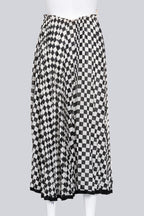 COMME DES GARCONS - A BLACK AND WHITE CHECKERED SKIRT