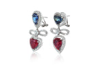 A PAIR OF BLUE SAPPHIRE AND GLASS-FILLED RUBIES EARRINGS
