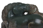 A CARVED GREEN JADE HORSES GROUP