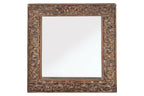A CARVED AND LACQUERED WOOD FRAMED MIRROR