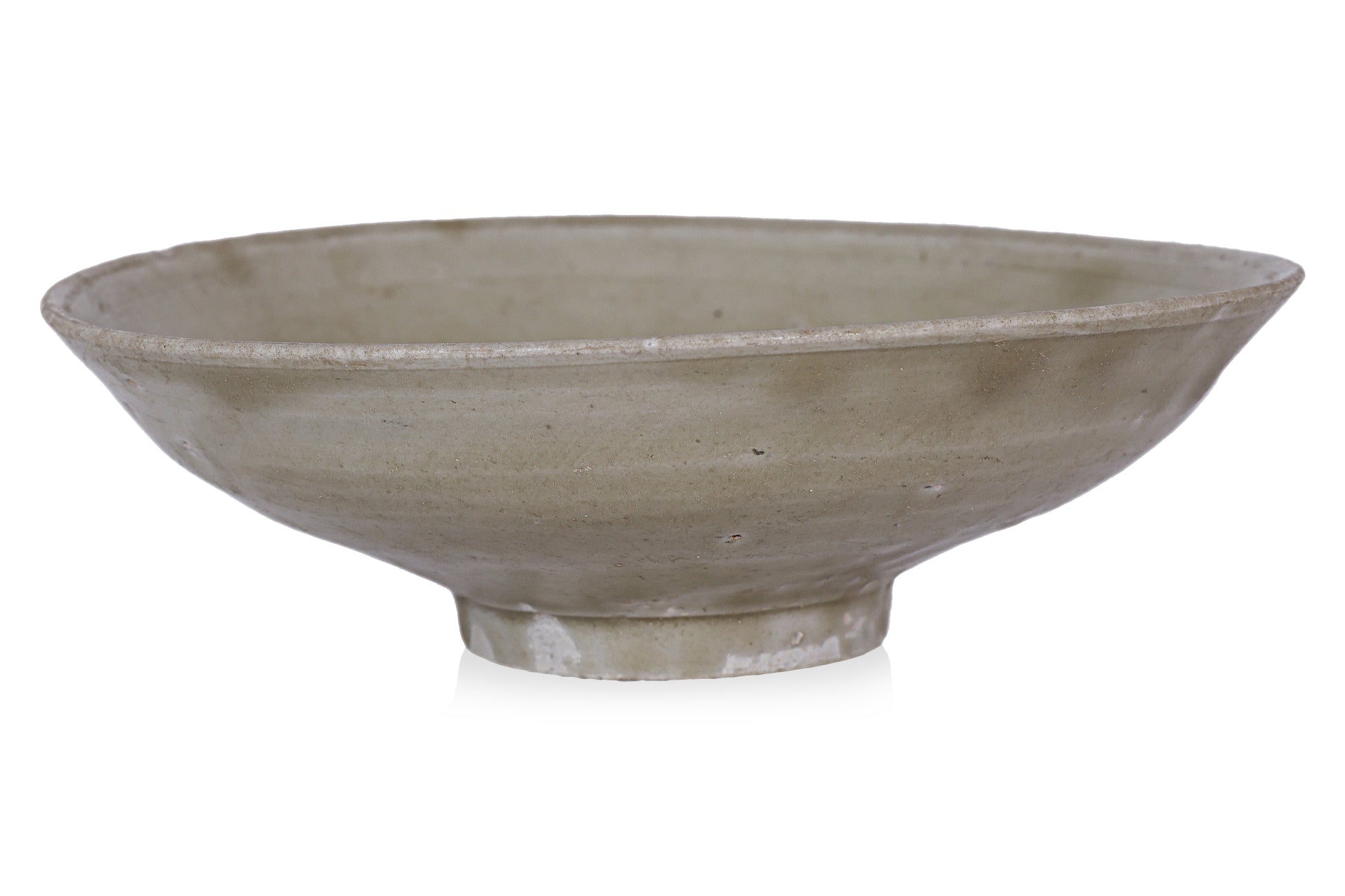 AN OLIVE-GLAZED STONEWARE BOWL