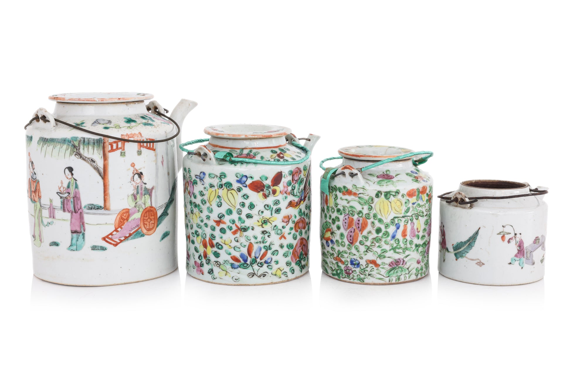 A GROUP OF FOUR FAMILLE ROSE PORCELAIN TEAPOTS