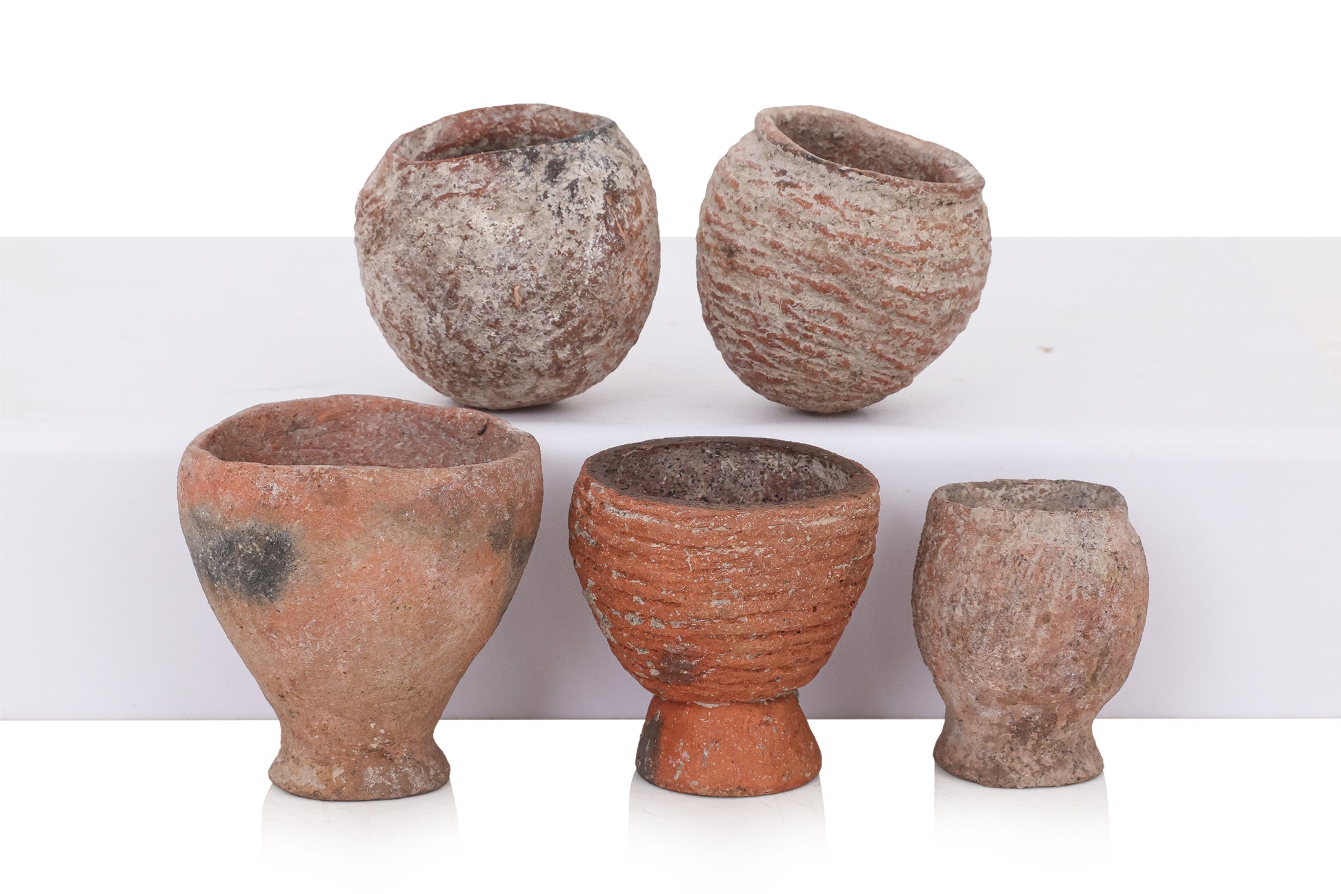 A GROUP OF TEN MINIATURE BAN CHIANG STYLE POTTERY VESSELS