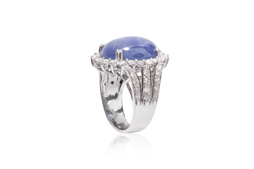 A STAR SAPPHIRE AND DIAMOND RING
