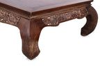 A CARVED TEAK RECTANGULAR COFFEE TABLE