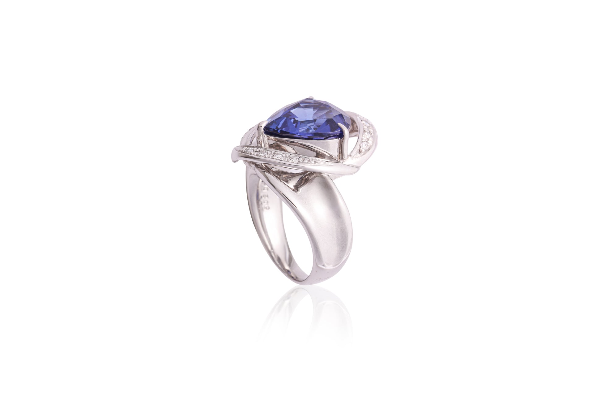 A TANZANITE AND DIAMOND 'ABSTRACT' RING
