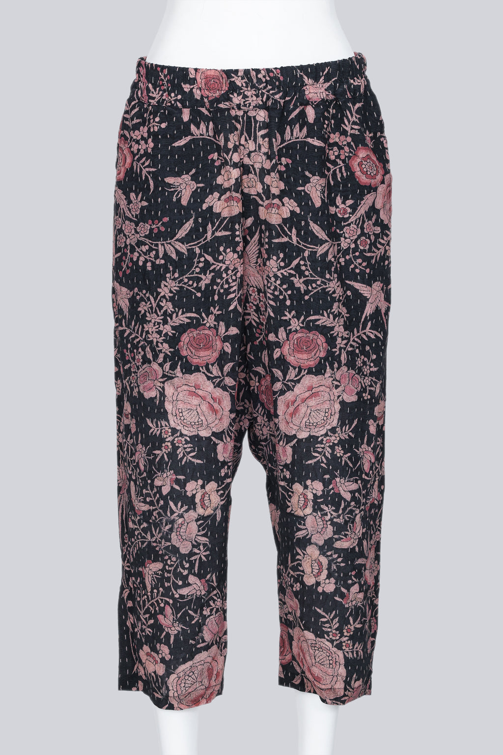 BY WALID - A PAIR OF BLACK AND PEACH FLORAL PRINT DROP CROTCH GAUCHOS