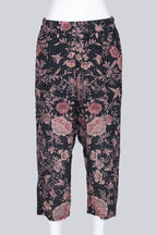 BY WALID - A PAIR OF BLACK AND PEACH FLORAL PRINT DROP CROTCH GAUCHOS