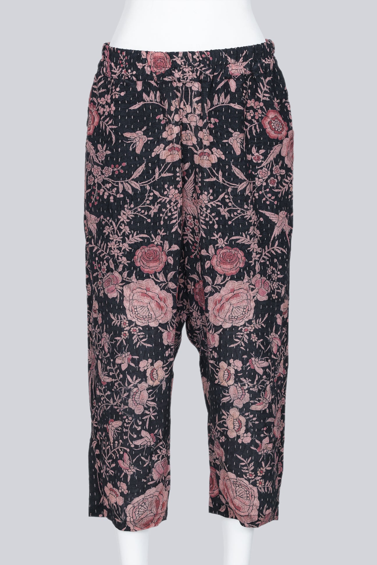BY WALID - A PAIR OF BLACK AND PEACH FLORAL PRINT DROP CROTCH GAUCHOS