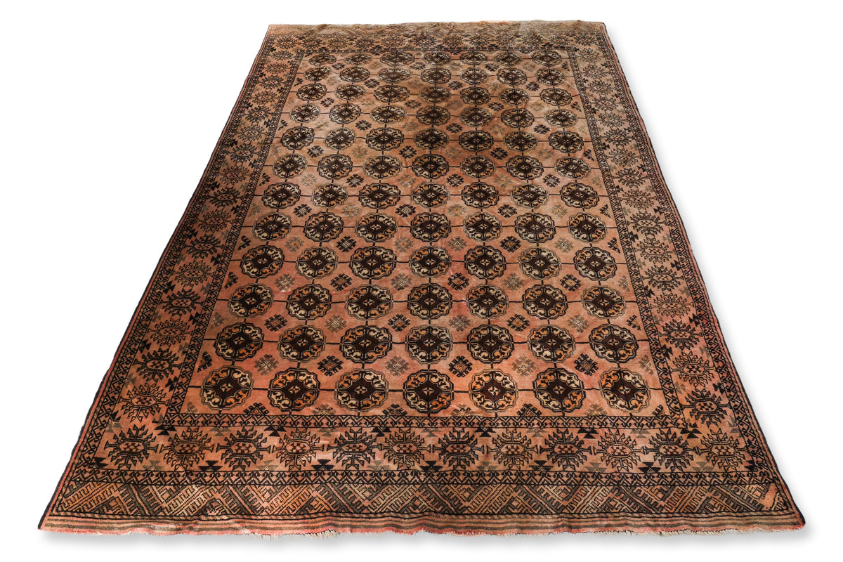 AN AFGHAN ELEPHANTS FOOT CARPET (302 X 193CM)