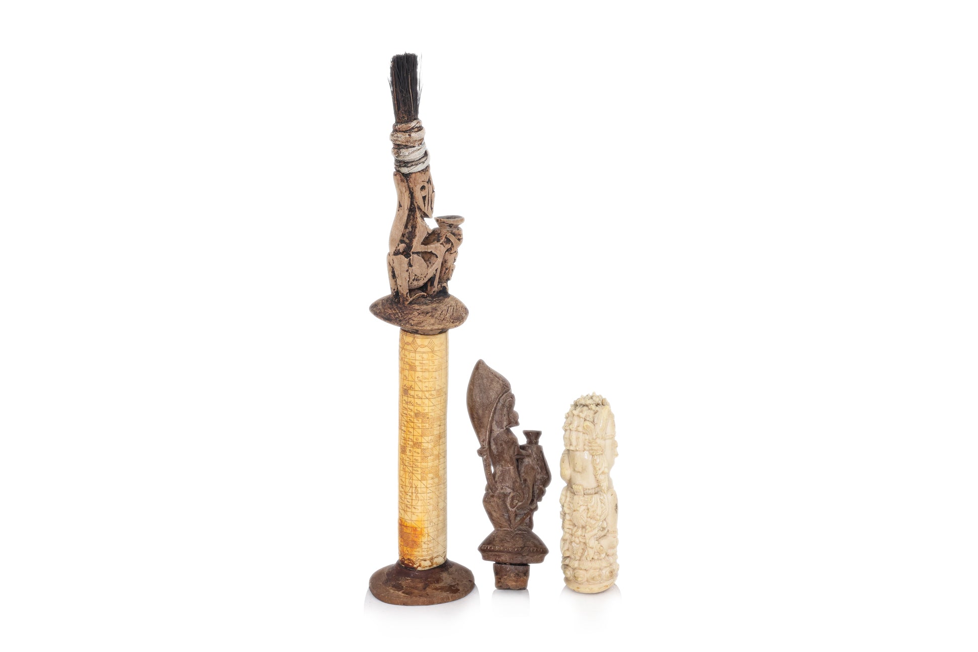 A GROUP OF SOUTHEAST ASIAN CARVED OBJECTS