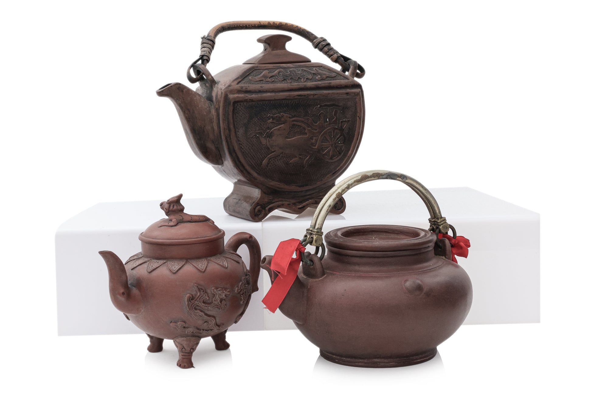 A GROUP OF SIX YIXING ZISHA POTTERY TEAPOTS