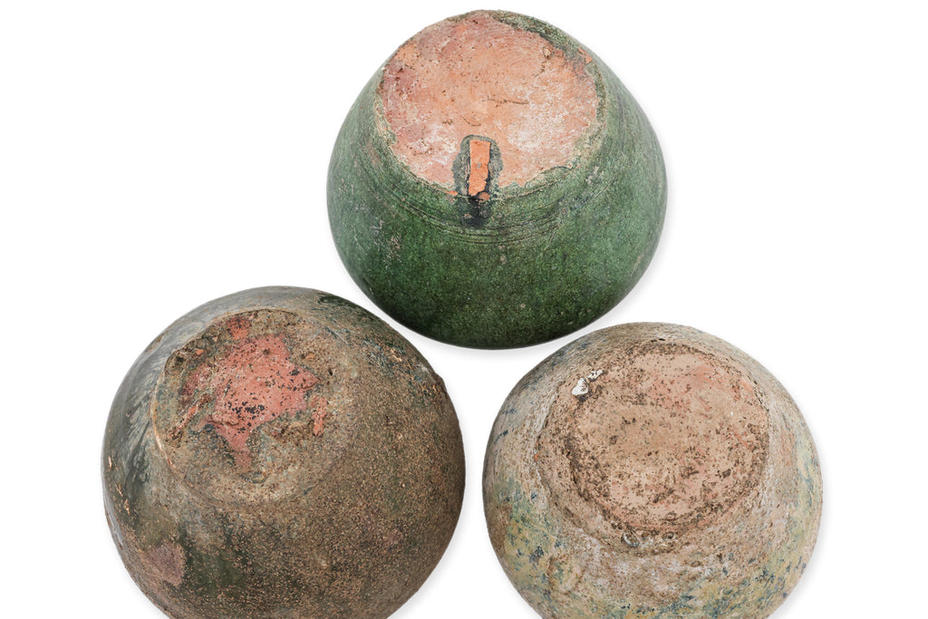 THREE GREEN-GLAZED JARS