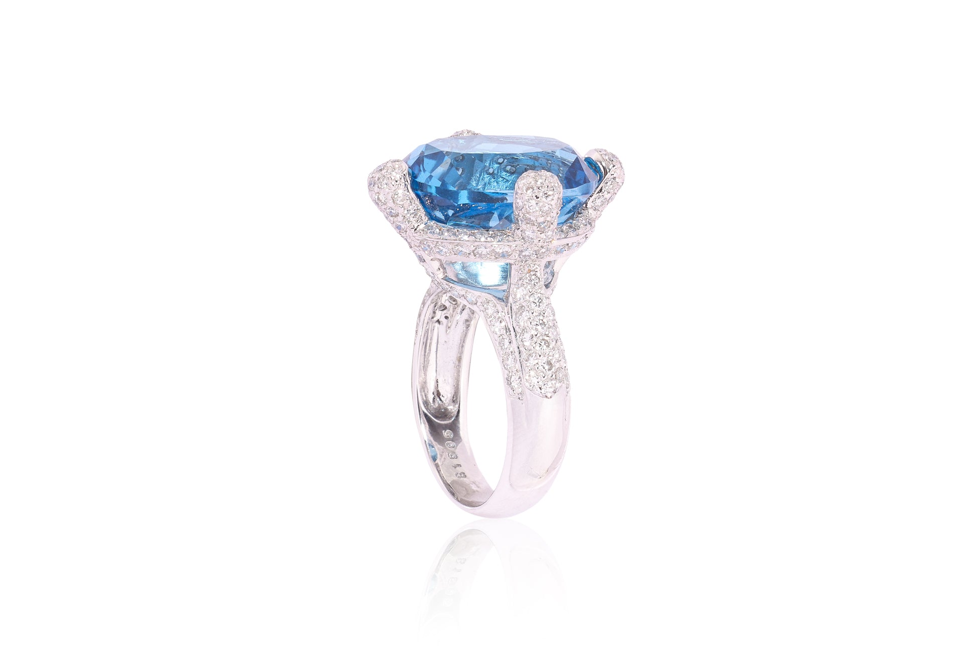 A BLUE TOPAZ AND DIAMOND RING