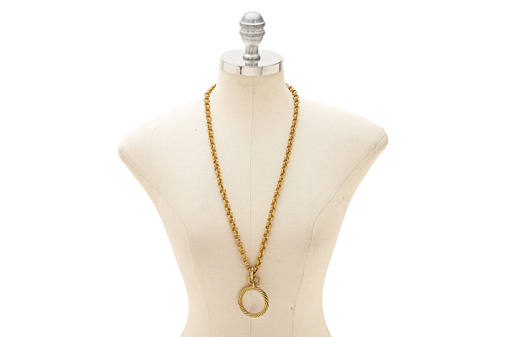 A CHANEL MONOCLE ON CHAIN