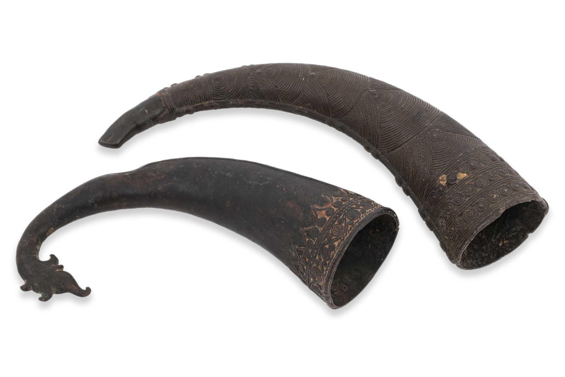 TWO SOUTHEAST ASIAN BRONZE 'RHYTON' DRINKING VESSELS AND A LADLE