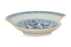 A BLUE AND WHITE LOTUS DECORATED PART-DISH
