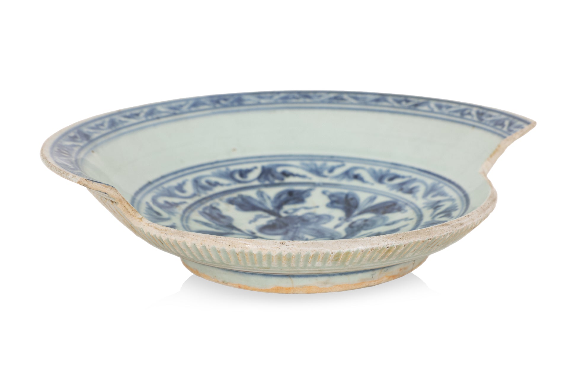 A BLUE AND WHITE LOTUS DECORATED PART-DISH