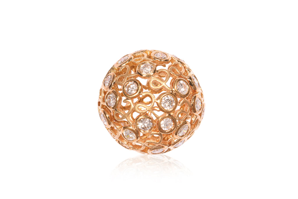 A PIERCED DIAMOND 'BALL' PENDANT