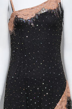 COLLETTE DINNIGAN - A BLACK MESH OVERDRESS WITH SLIP