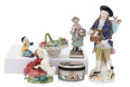 A GROUP OF SIX PORCELAIN FIGURINES AND ORNAMENTS