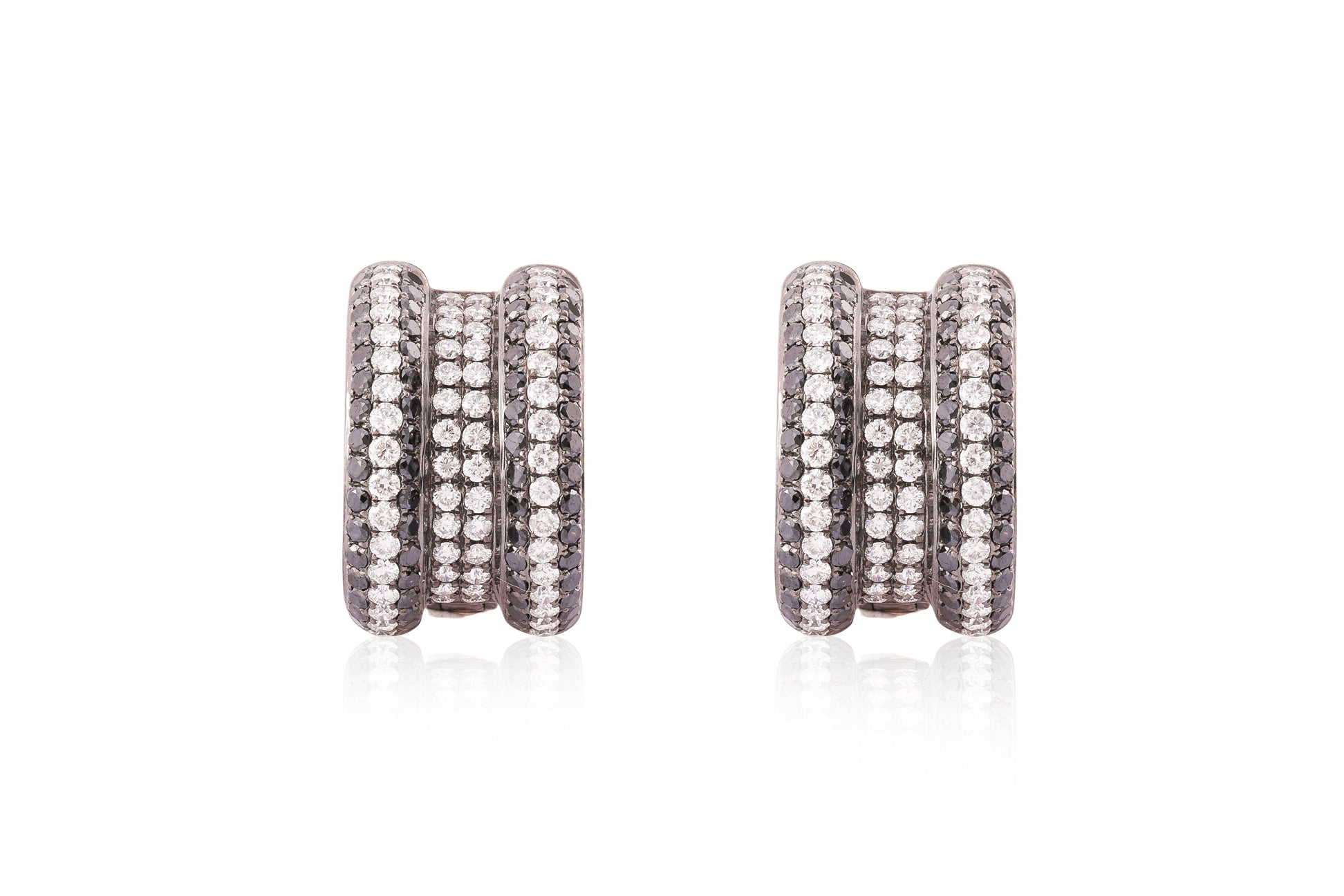A PAIR OF DIAMOND AND BLACK DIAMOND EARRINGS