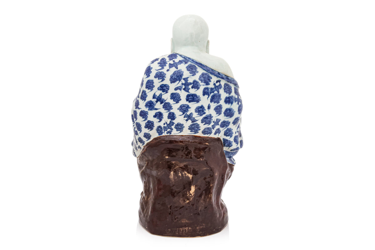 A LARGE PORCELAIN FIGURE OF BUDAI