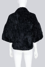LIMI FEU - A BLACK FAUX FUR JACKET WITH OVERSIZED BUTTONS