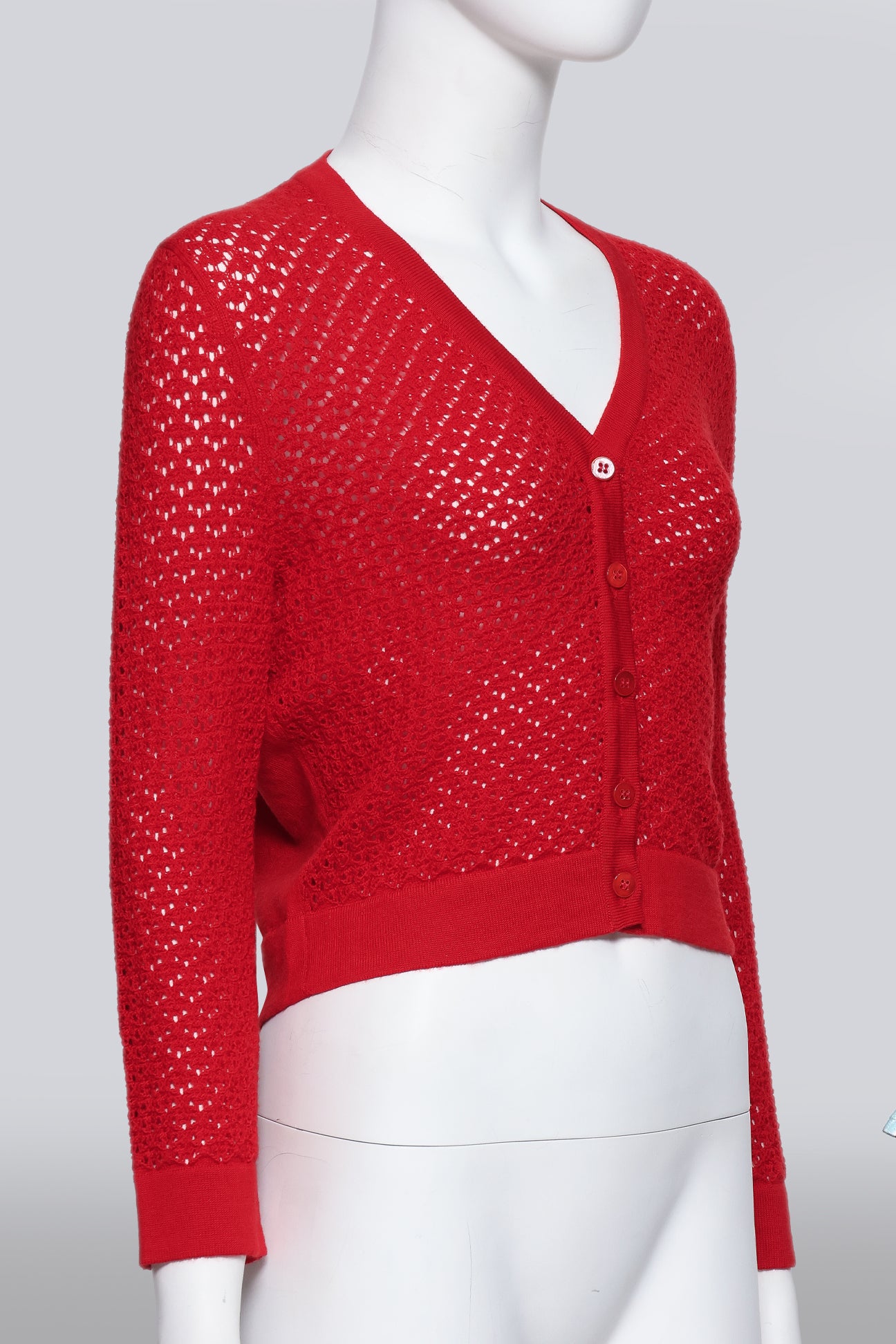 CAROLINA HERRERA - A RED KNIT CARDIGAN