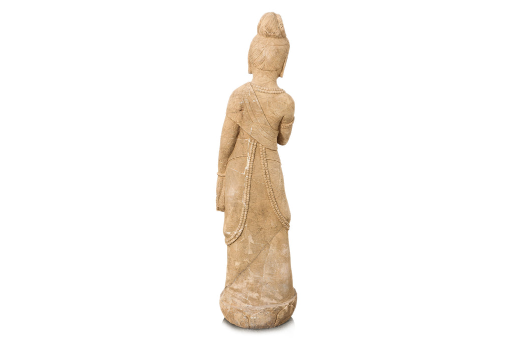 A LARGE CARVED STONE FIGURE OF A STANDING BODHISATTVA