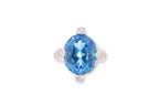 A BLUE TOPAZ AND DIAMOND RING