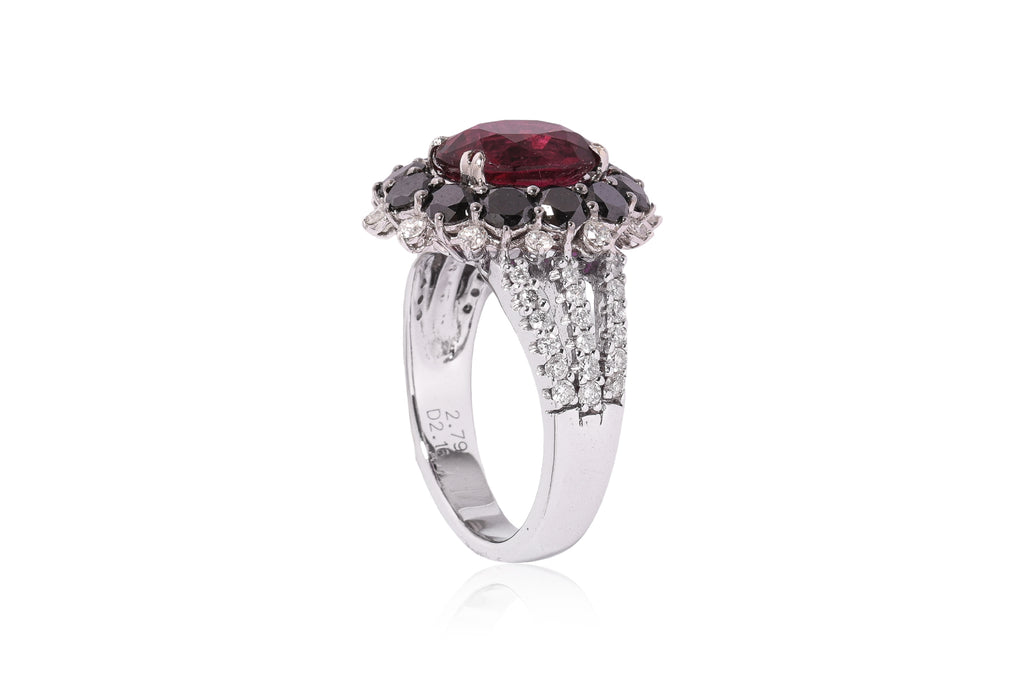 A TOURMALINE, BLACK DIAMOND AND DIAMOND RING