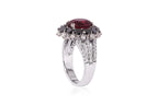 A TOURMALINE, BLACK DIAMOND AND DIAMOND RING