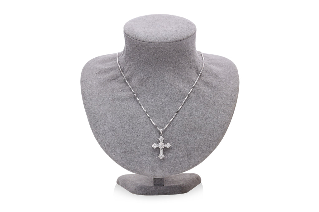 A DIAMOND 'CROSS' PENDANT ON CHAIN