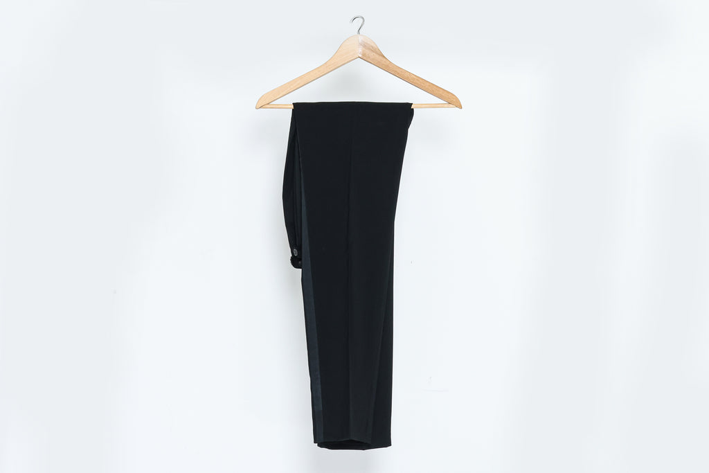 GIANNI VERSACE COUTURE - A PAIR OF BLACK TROUSERS