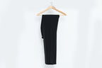 GIANNI VERSACE COUTURE - A PAIR OF BLACK TROUSERS