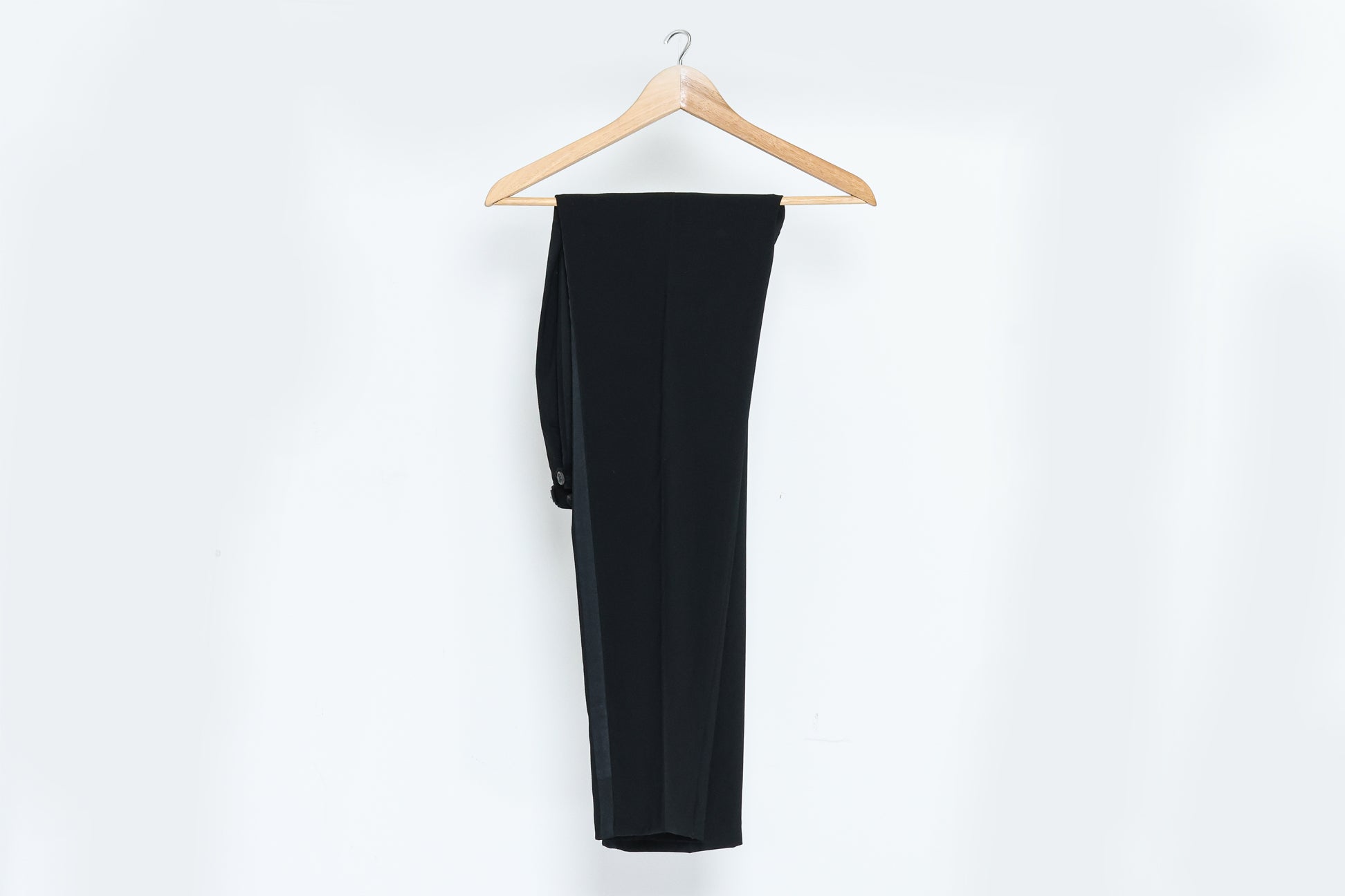 GIANNI VERSACE COUTURE - A PAIR OF BLACK TROUSERS